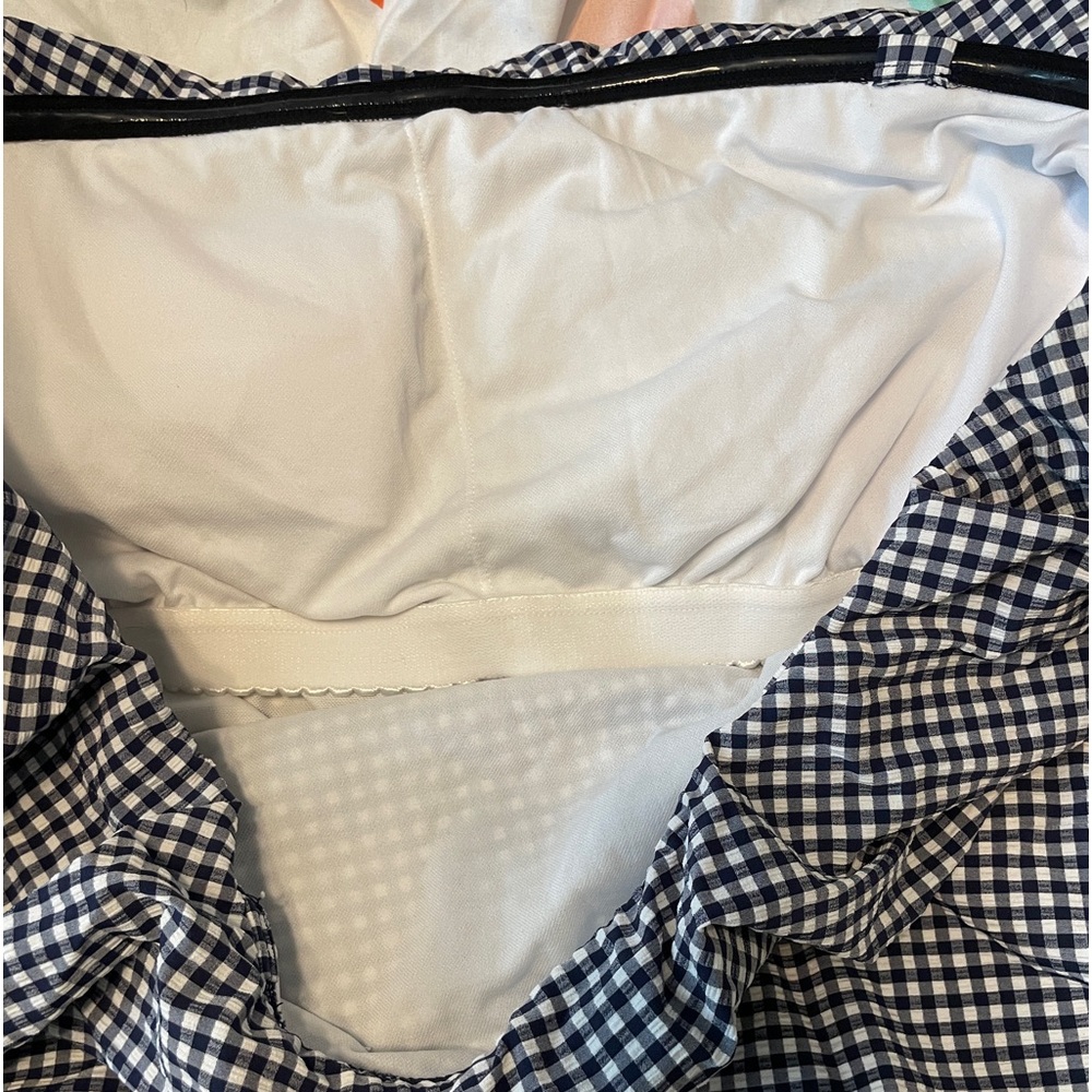 Strapless swim suit w/ built in bra.